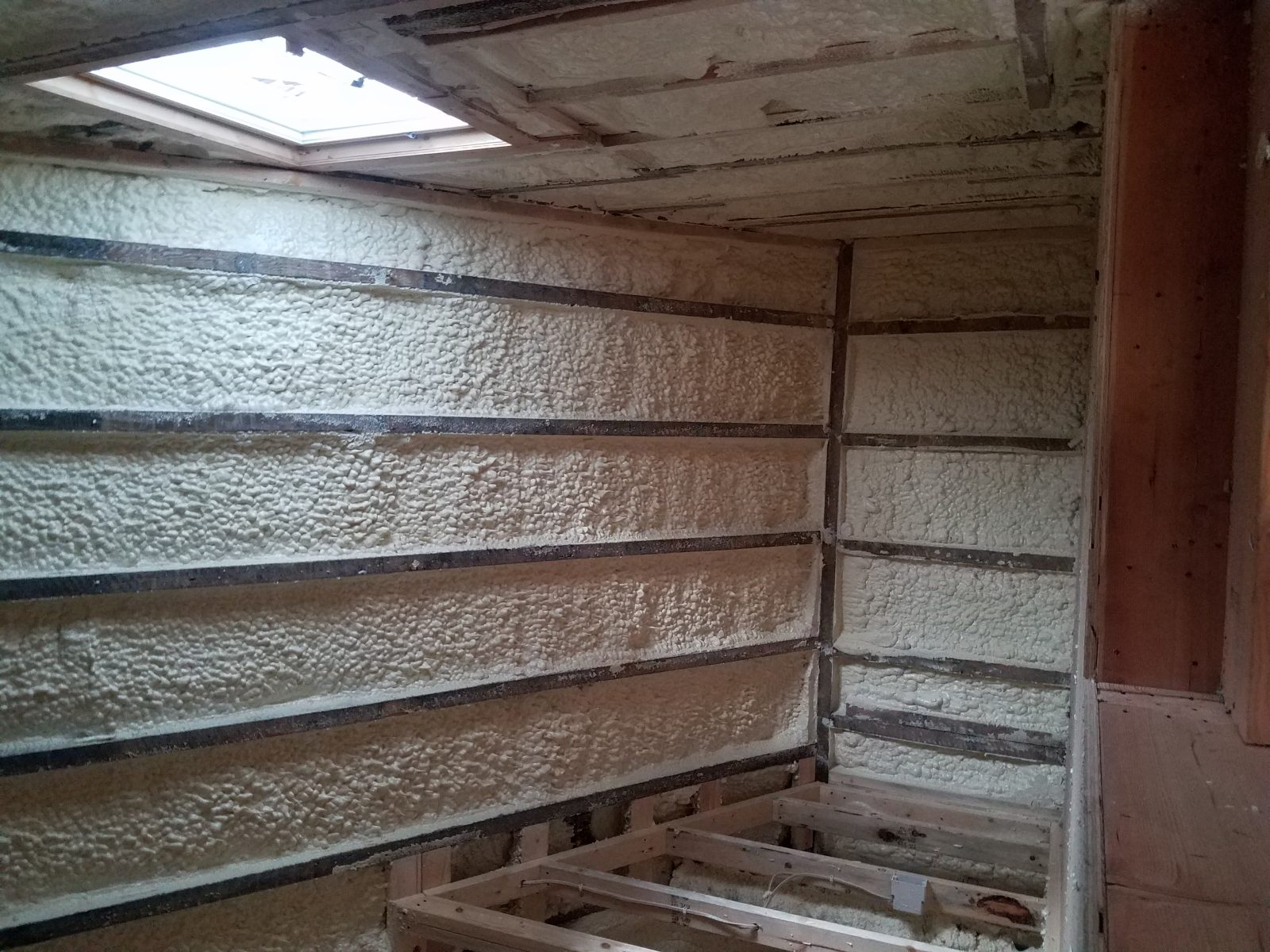 Spray foam contractor at work